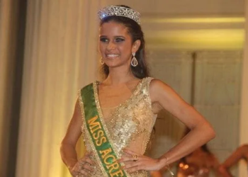 Iasmyne recebeu a faixa de miss e já desfilou com ela