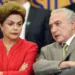 Brazilian President Dilma Rousseff and her vice President Michel Temer attend the launching ceremony of the Logistics Investment Program (LIP), at the Planalto Palace in Brasilia, on June 9, 2015. Brazil announced a $64-billion infrastructure spending package on Tuesday, hoping to revive its flagging economy with investment in highways, railroads, ports and airports.     AFP PHOTO/EVARISTO SA
