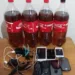 Oito litros de whisky e nove celulares foram apreendidos antes que entrassem no presídio (Foto: Cedida)