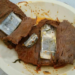 Mulher tenta entrar em presídio levando celular dentro de bife de carne