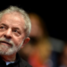 (FILES) This file photo taken on August 29, 2015 shows Brazilian former president (2003-2011) Luiz Inacio Lula Da Silva participating in the 12th Congress of the Brazilian Workers Union (CUT) in Belo Horizonte, Brazil, on August 28, 2015. 
Brazil police search home on March 4, 2016 of ex-president Lula da Silva in corruption probe.  / AFP / DOUGLAS MAGNO