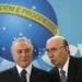 Brazil's President Michel Temer speaks with Brazil's Finance Minister Henrique Meirelles during a ceremony to launch the new program of the Brazilian state development lender BNDES at the Planalto Palace in Brasilia, Brazil August 23, 2017. REUTERS/Adriano Machado