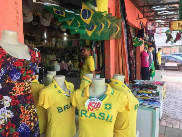 COPA DO MUNDO: Vendas de televisões, camisas, bandeiras e artigos de decoração ainda são tímidas