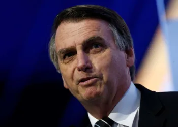 Federal deputy Jair Bolsonaro of the Party for Socialism and Liberation (PSL), a pre-candidate for Brazil's presidential election, attends a debate at the Industry Confederation event in Brasilia, Brazil July 4, 2018. REUTERS/Adriano Machado