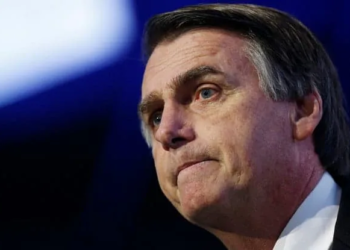 Federal deputy Jair Bolsonaro of the Party for Socialism and Liberation (PSL), a pre-candidate for Brazil's presidential election, attends a debate at the Industry Confederation event in Brasilia, Brazil July 4, 2018. REUTERS/Adriano Machado