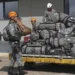Equipes da Força Nacional, que ajudarão no combate ao incêndio na Amazônia, embarcam na  Base Aérea de Brasília
