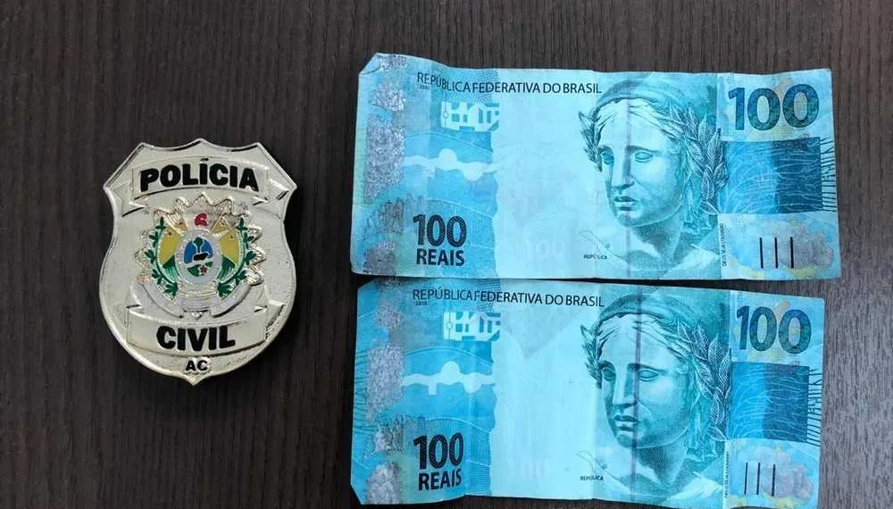 Vítimas que receberam duas notas falsas de R$ 100 acionaram a polícia — Foto Divulgação Polícia Civil do Acre