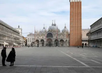 The almost empty St. Mark?s Square is seen after the Italian government imposed a virtual lockdown on the north of Italy including Venice to try to contain a coronavirus outbreak, in Venice, Italy, March 9, 2020. REUTERS/Manuel Silvestri