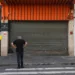 A man is seen in front of closed stores after the city's government decreed the closure of shops and stores as a precautionary measure against coronavirus disease (COVID-19) in downtown Sao Paulo, Brazil, March 20, 2020. REUTERS/Amanda Perobelli