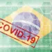 Brazil flag and futuristic digital abstract composition with Covid-19 inscription. Coronavirus outbreak concept