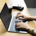 Woman using a laptop at work