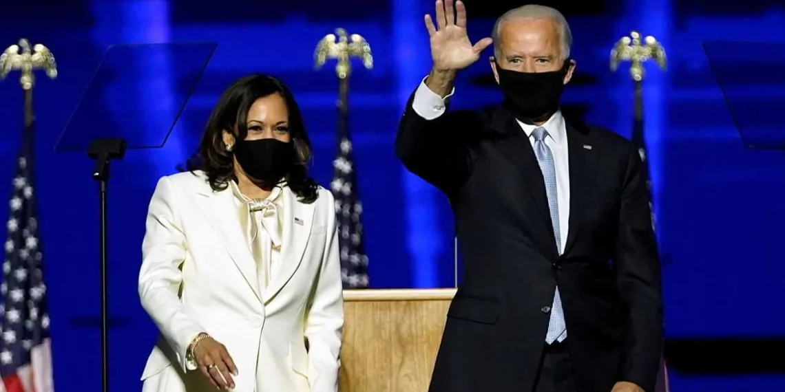 Democratic vice-presidential nominee Kamala Harris and Democratic 2020 U.S. presidential nominee Joe Biden greet supporters at an election rally, after news media announced that Biden has won the 2020 U.S. presidential election, in Wilmington, Delaware, U.S., November 7, 2020. Andrew Harnik/Pool via REUTERS