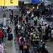 Passengers gather at Sao Paulo International Airport amid the outbreak of the coronavirus disease (COVID-19) and after Omicron has become the dominant coronavirus variant in the country, in Guarulhos, Brazil January 12, 2022.  REUTERS/Roosevelt Cassio