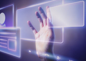 Woman touching a smart technology holographic interface