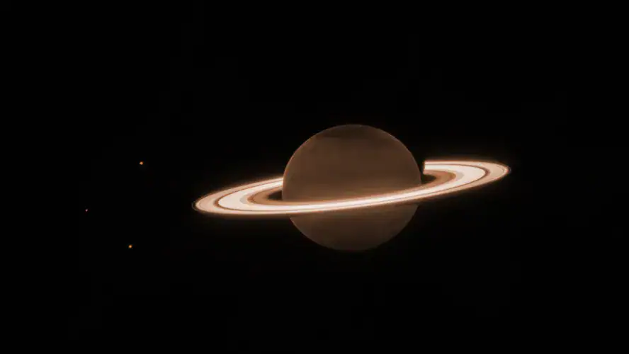 Foto: : NASA, ESA, CSA, STScI, M. Tiscareno (SETI Institute), M. Hedman (University of Idaho), M. El Moutamid (Cornell University), M. Showalter (SETI Institute), L. Fletcher (University of Leicester), H. Hammel (AURA); processamento de imagem por J. DePasquale (STScI).