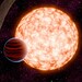 O planeta e a estrela que ele orbita são cercados por um disco protoplanetário desalinhado — Foto: NASA/JPL-Caltech/R. Hurt, K. Miller (Caltech/IPAC)