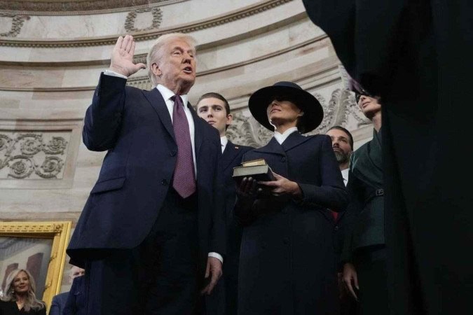 Durante durante discurso de posse: ameaças a imigrantes seguem - (crédito: Morry Gash / POOL / AFP)