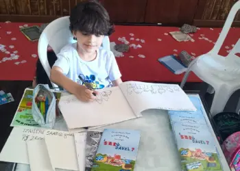 Aos 7 anos, menino autista estreia livro sobre amizade e comida saudável