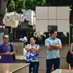 FOTOS: Famílias lotam cemitérios de Rio Branco no Dia de Finados