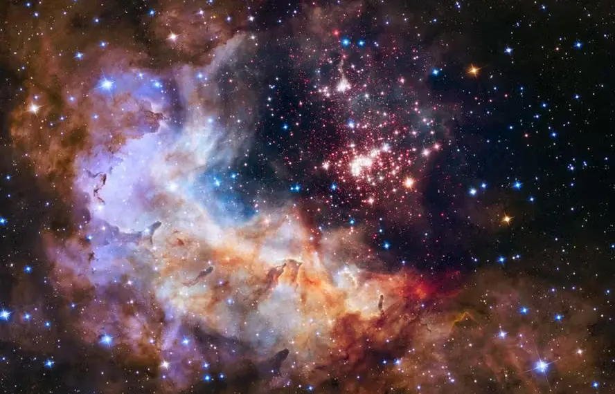 Estudo traz evidências de que o Universo está encolhendo, não expandindo; entenda 1 Uma tapeçaria brilhante de estrelas jovens ganhando vida assemelha-se a um espetáculo de fogos de artifício nesta imagem do Telescópio Espacial Hubble — Foto: NASA, ESA, Equipe Hubble Heritage (STScI/AURA), A. Nota (ESA/STScI) e Equipe Científica do Westerlund 2