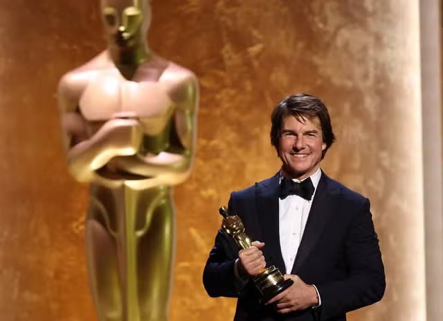 Tom Cruise recebe Oscar honorário por sua carreira 1 Tom Cruise recebe Oscar honorário por sua carreira — Foto: Michael Tran / AFP